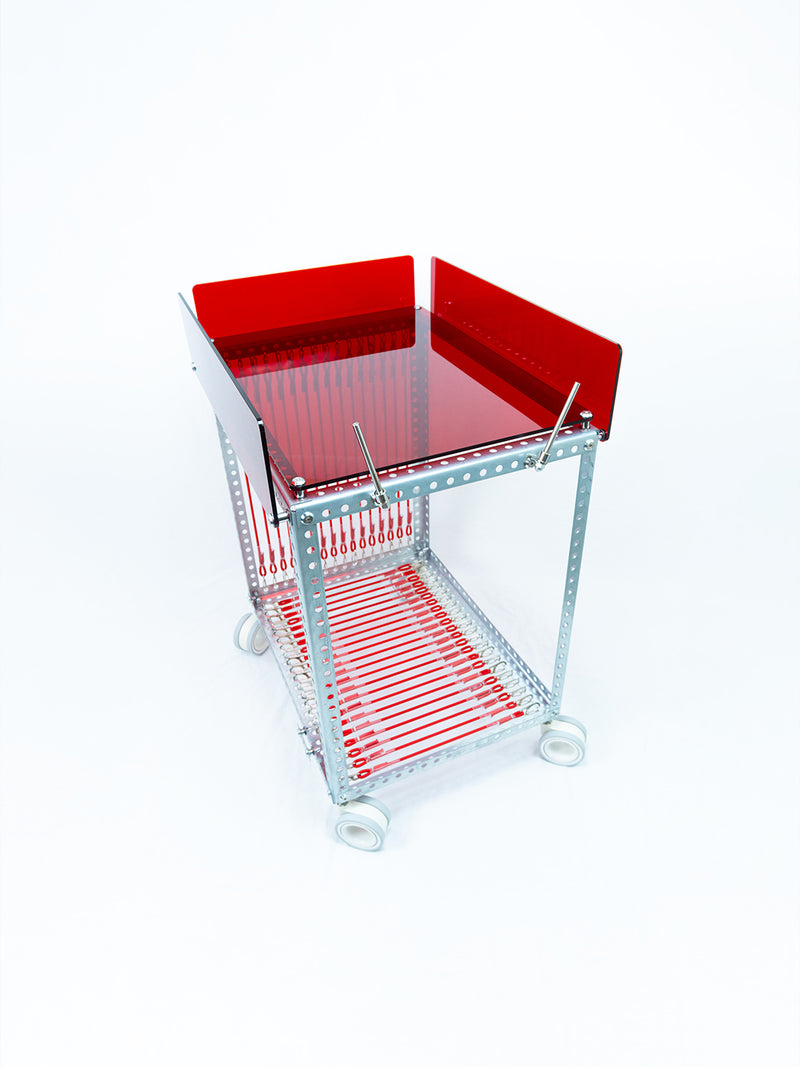 Red Bar Cart three-quarter view — red acrylic top and side panels, galvanized steel frame on rolling casters